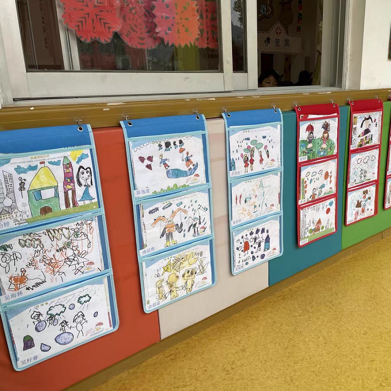 幼儿园作品展示挂袋绘画美术作品收纳袋透明图书绘本收纳袋墙挂式