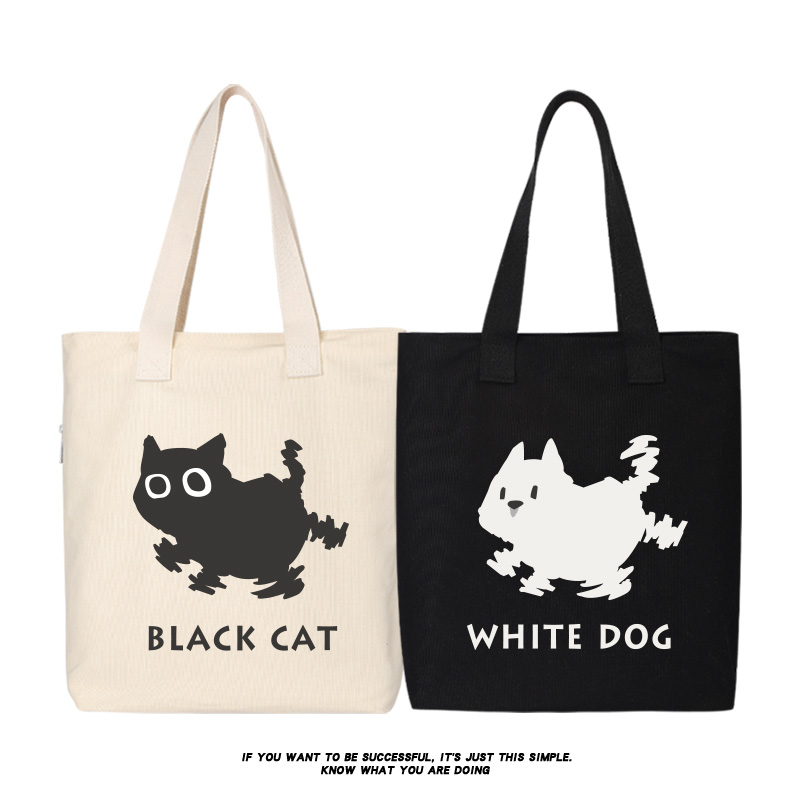 秀洛迷幻黑猫白狗帆布包猫狗日系手提袋购物包袋子托特包大手提包