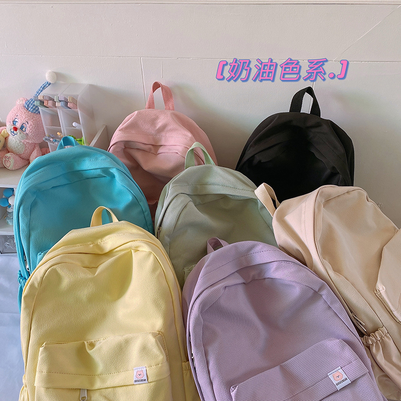 漂亮脸蛋 书包女韩版初中生可爱奶黄色背包高中学生大容量双肩包
